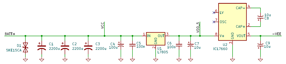 DC-bus input protection, bulk capacitance, 5V regulator, and negative charge-pump supply.